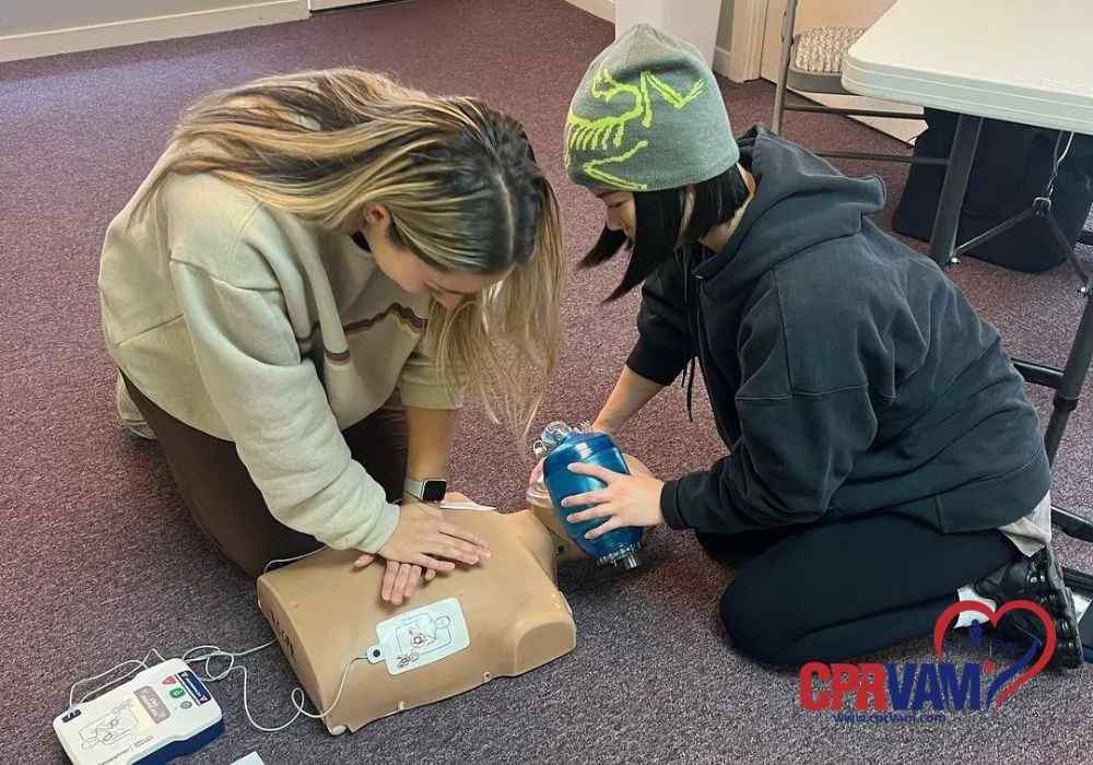 Students are practicing CPR at the training center